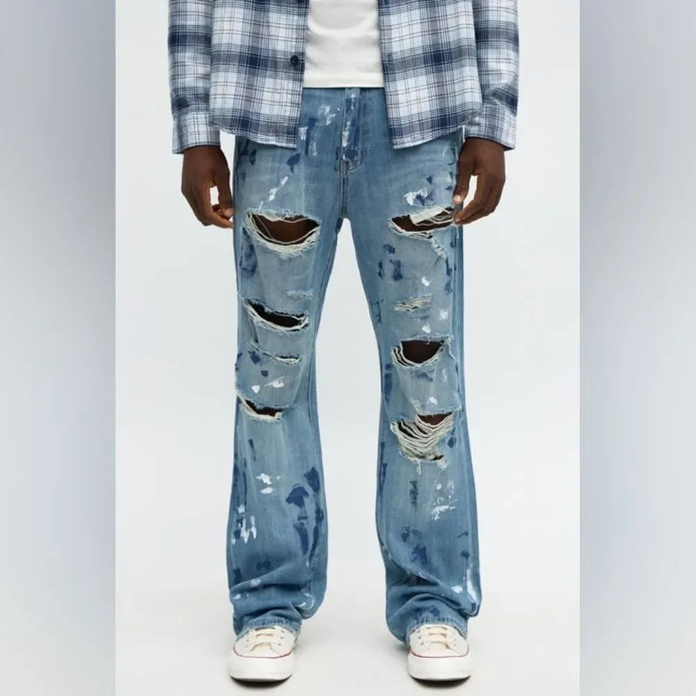 Fashion Nova  Stacked Slim Flare Call It Art Paint Splatter Ripped Jeans